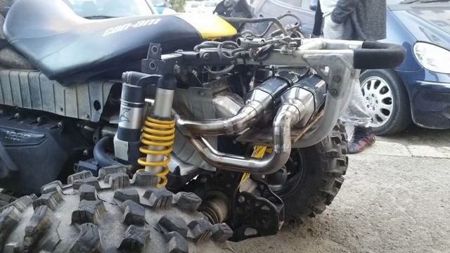Sistem de evacuare sudat, montat pe ATV