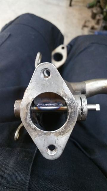 Piesă cu flanșă, reparată prin sudură